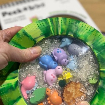 BOLSA SENSORIAL PEEKABOO DINOSAUR